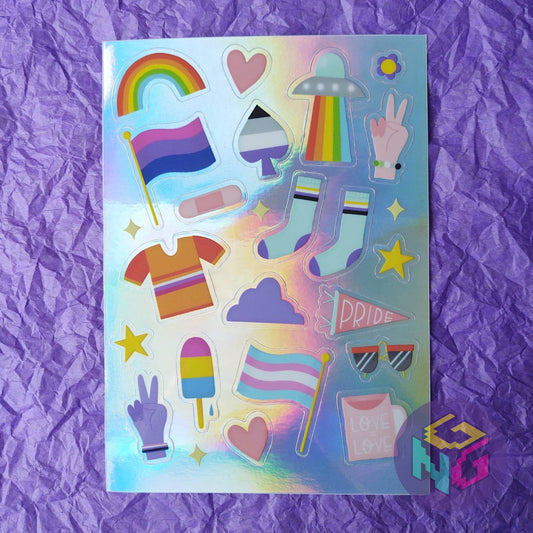 andyrogyny and gay nerd goods rainbow holographic sticker sheet with over twenty tiny pride stickers flat on purple background