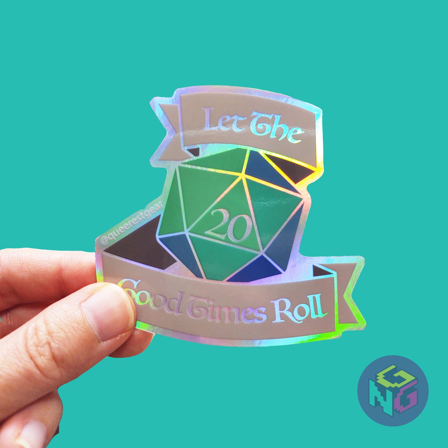 rainbow holographic let the good times roll d20 sticker held in hand against mint green background