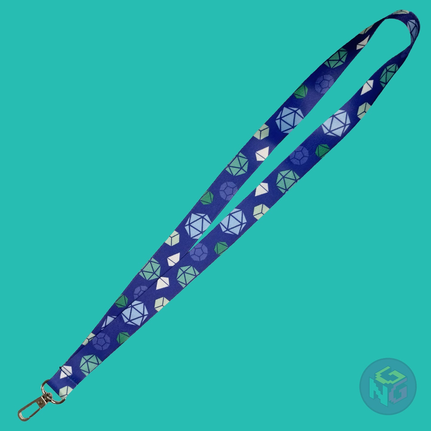the gay dice lanyard lying flat showing the complete design and repeating pattern of polyhedral dice in gay mlm colors