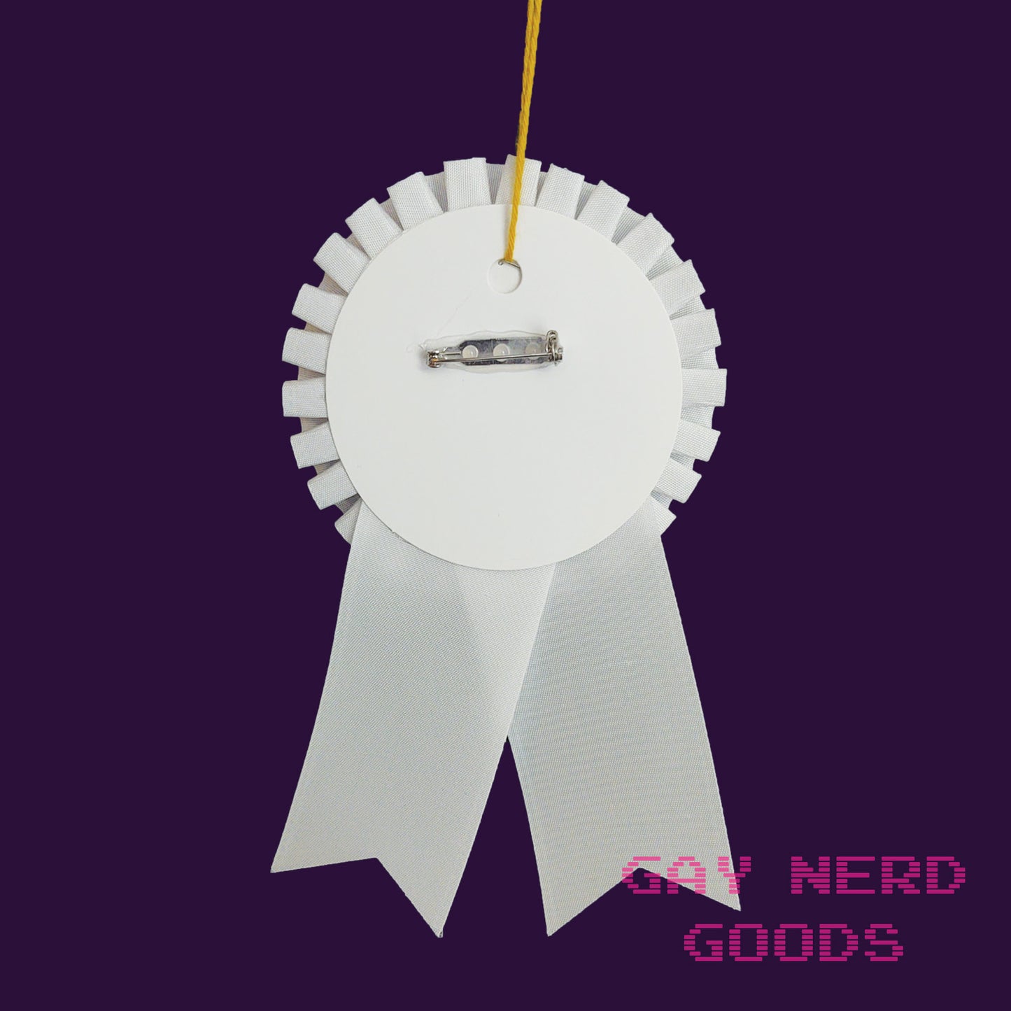 back view of the world's gayest gay ribbon showing the thread loop and pinback