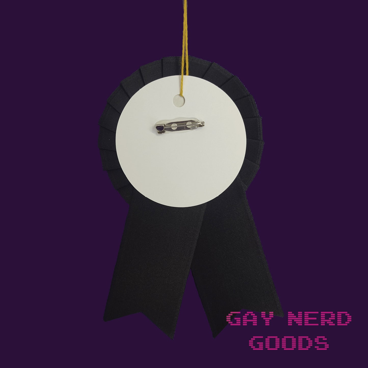 back view of the world's okayest DM award ribbon showing the thread loop and pinback