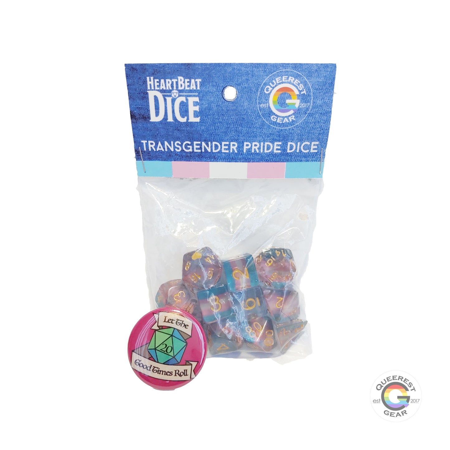 Transgender pride dice in their packaging with a free “let the good times roll” button