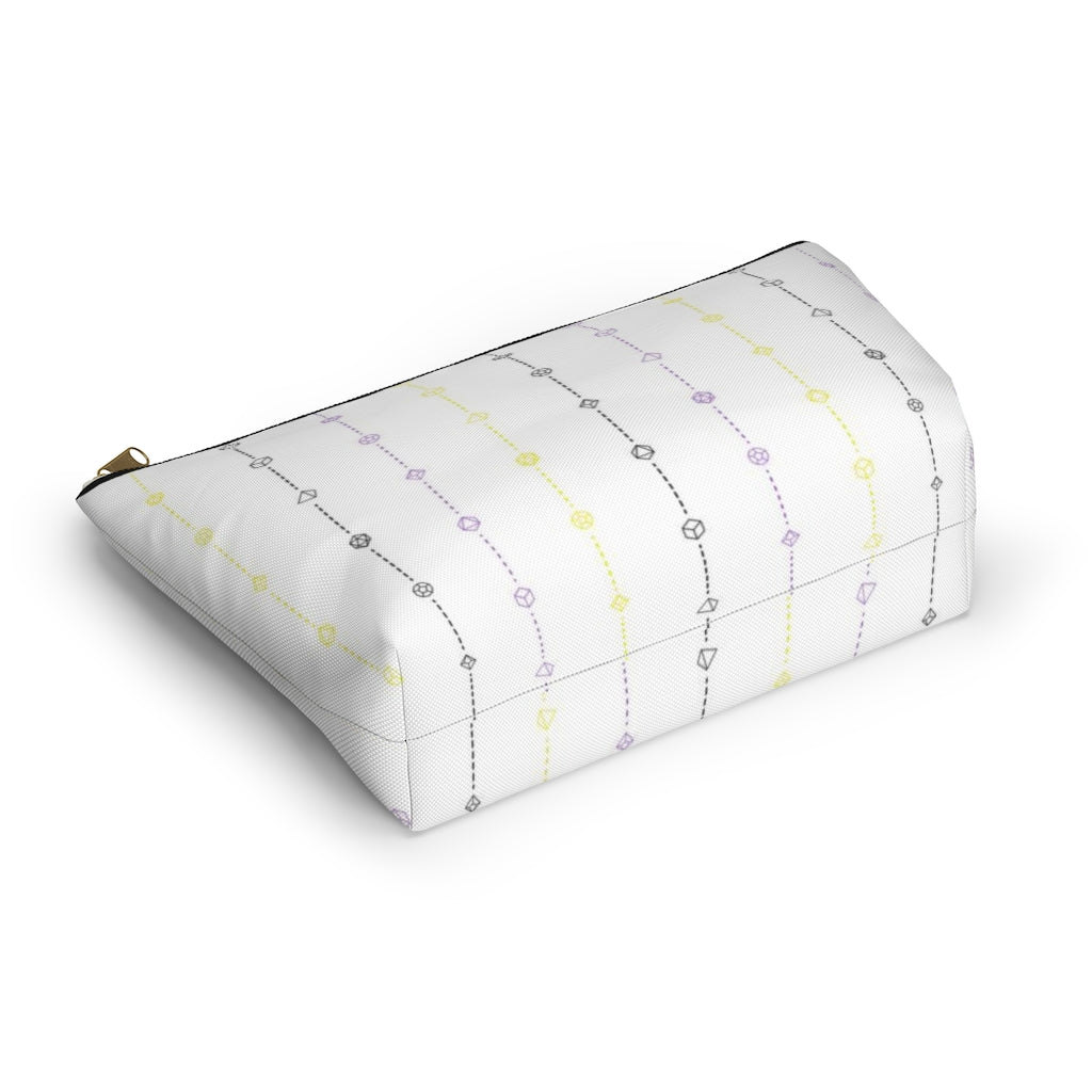 the large nonbinary dice t-bottom pouch in bottom view on a white background. it's white with black, yellow, and purple stripes of dashed lines and polyhedral dice and a gold zipper pull
