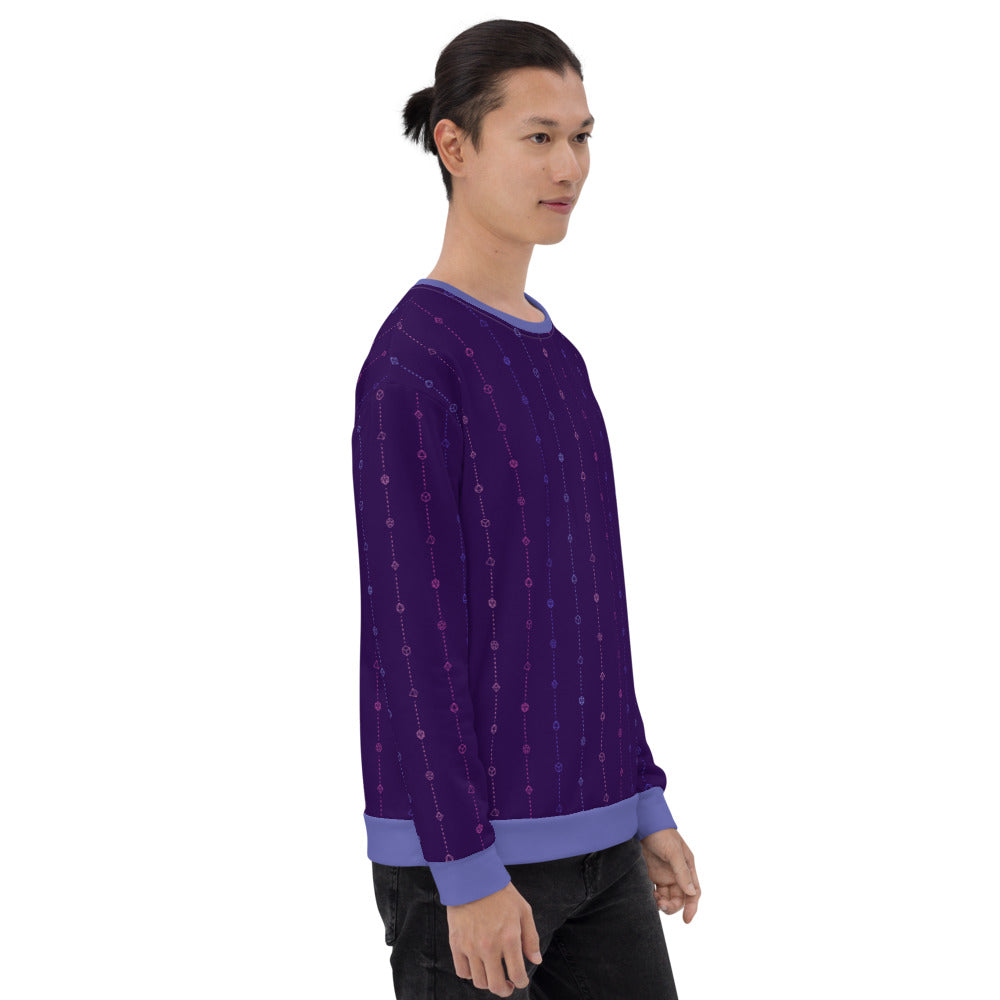 light-skinned dark haired model on a white background facing right wearing the omnisexual pride dice sweater