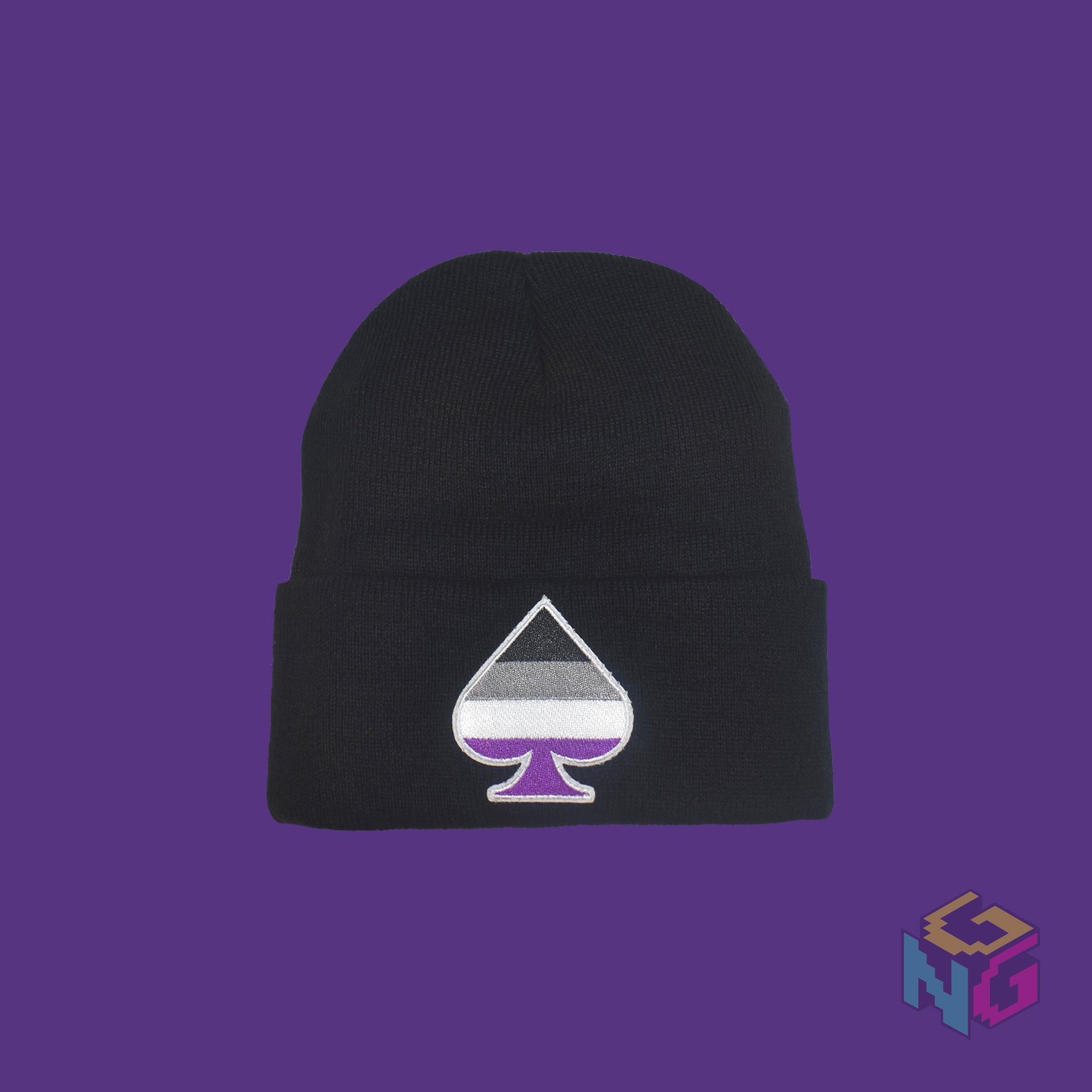 Black knit fabric beanie with the asexual ace of spades symbol in asexual black, white, grey, and purple on the front. It is laying flat on a purple background