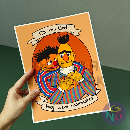 print of bert and ernie puppets hugging with caption oh my god they were roommates