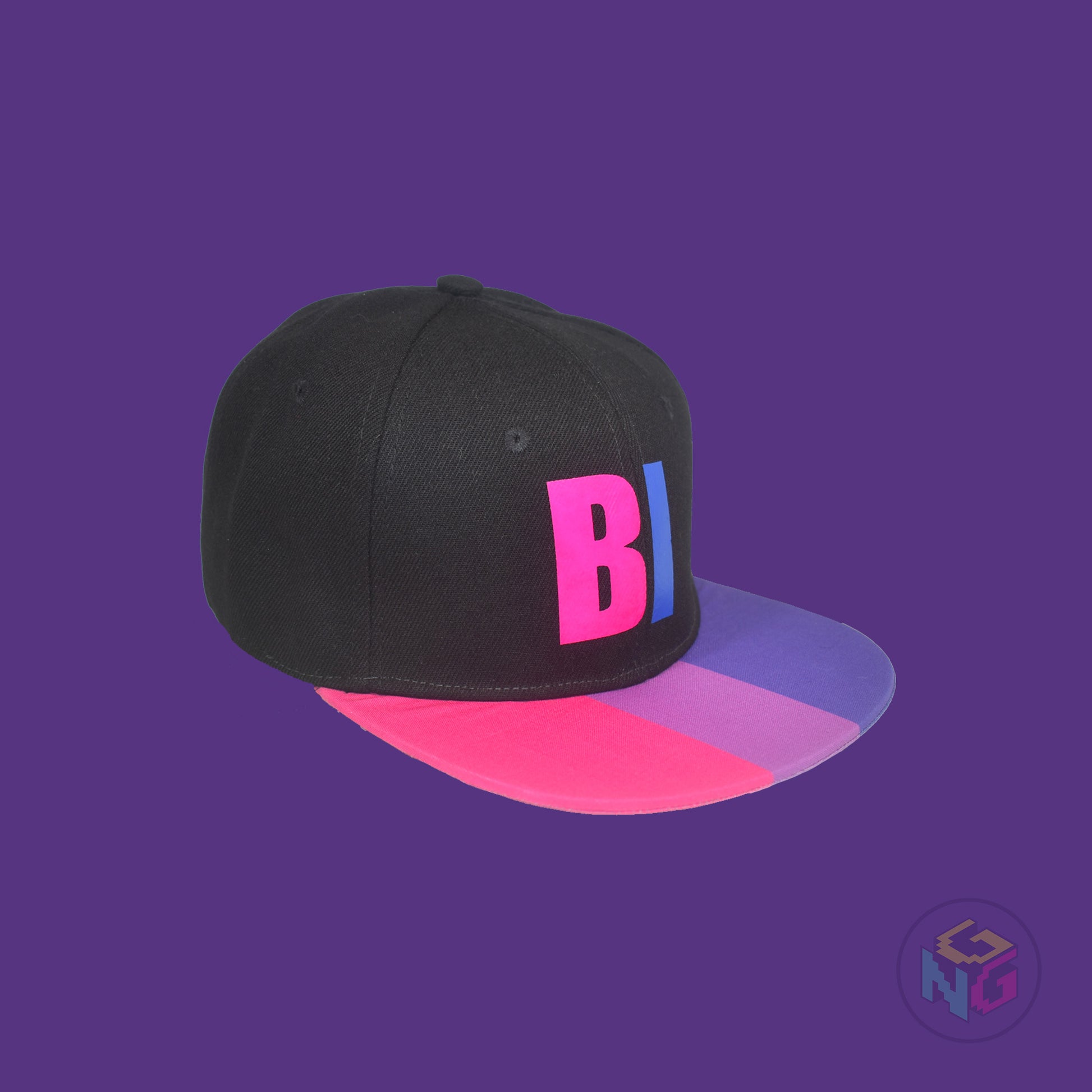 Black flat bill snapback hat. The brim has the bisexual pride flag on both sides and the front of the hat has the word “BI” in pink and blue. Front right view