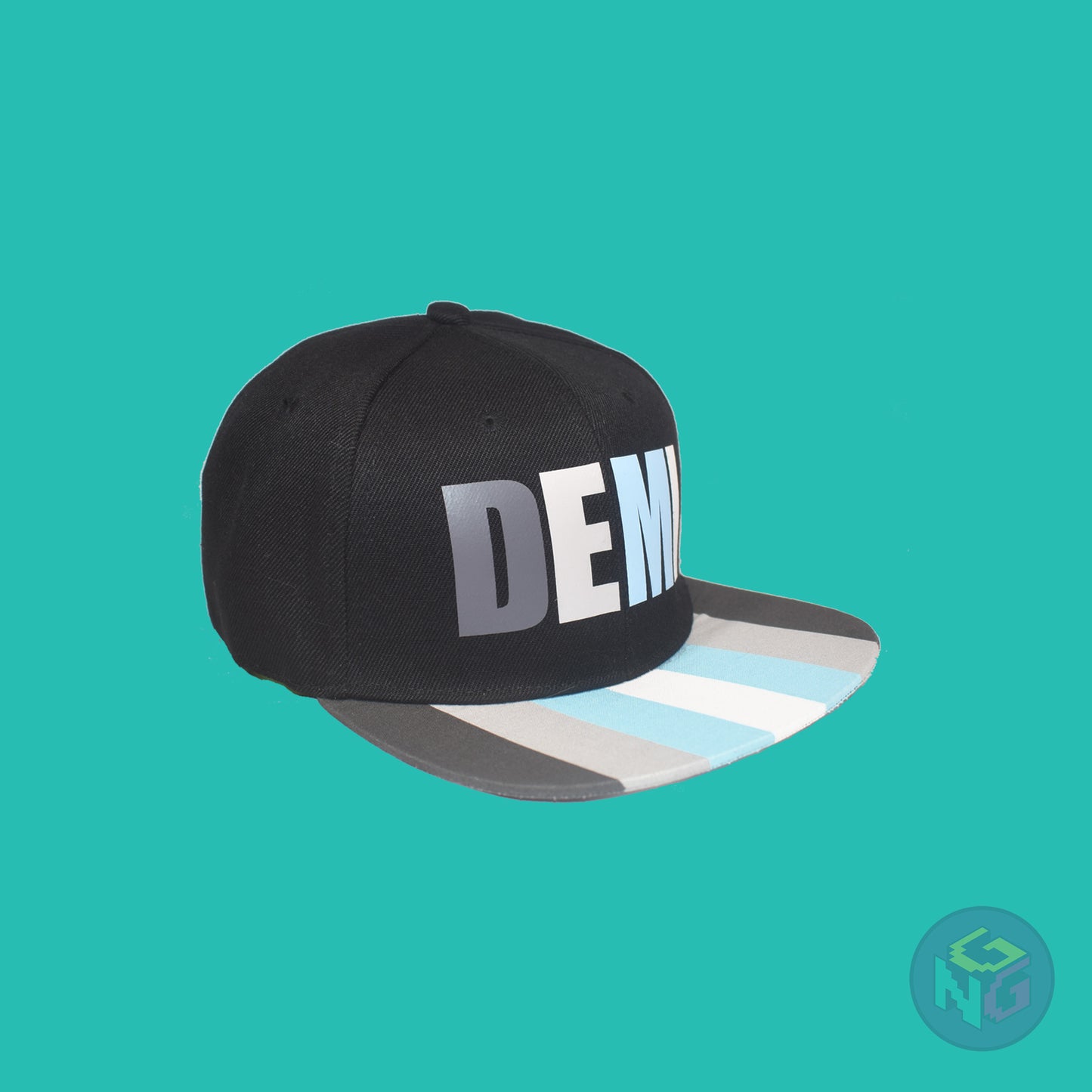 Black flat bill snapback hat. The brim has the demiboy pride flag on both sides and the front of the hat has the word “DEMI” in dark grey, light grey, blue, and white. Front right view