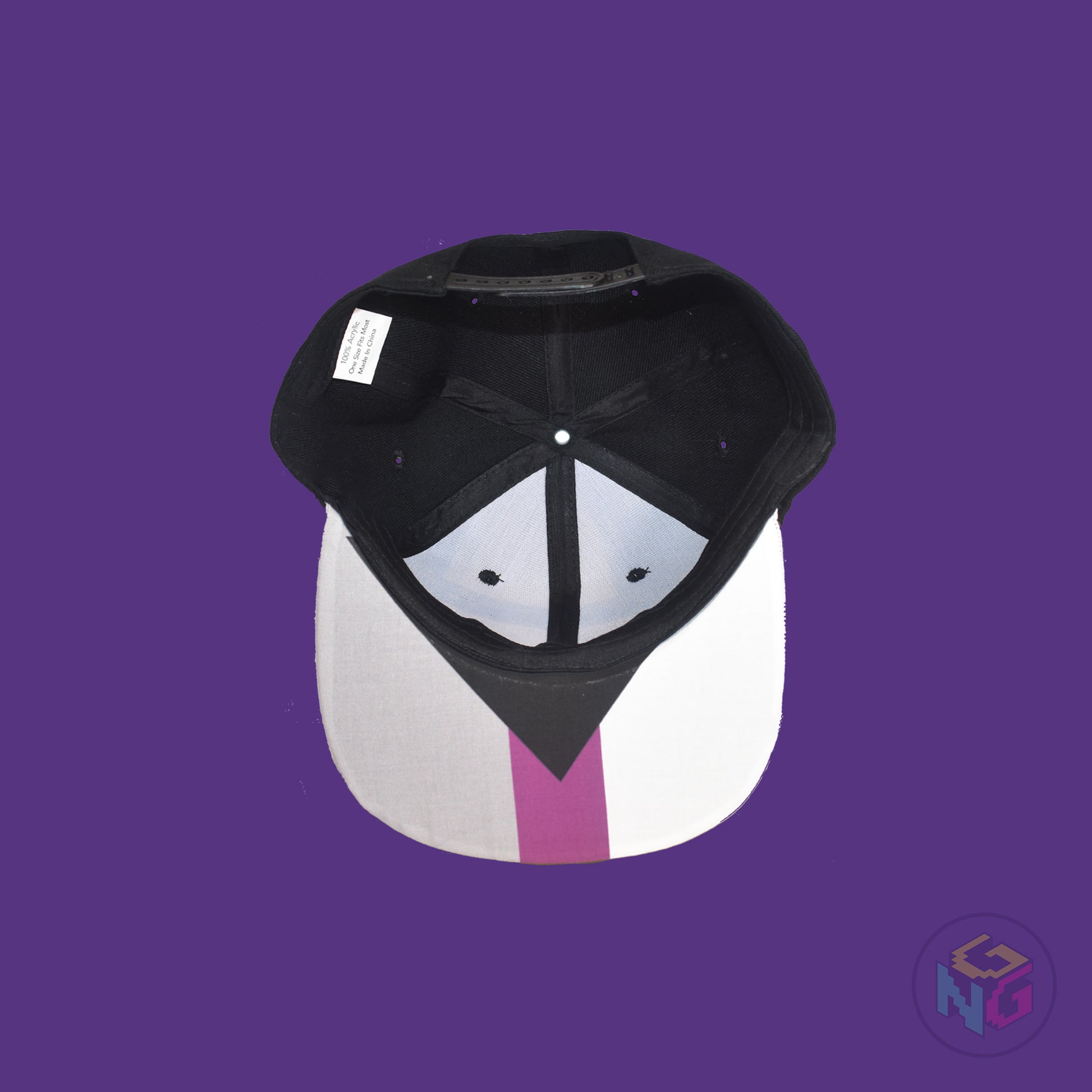 Black flat bill snapback hat. The brim has the demisexual pride flag on both sides and the front of the hat has the word “DEMI” in purple, white, and grey. Underside view