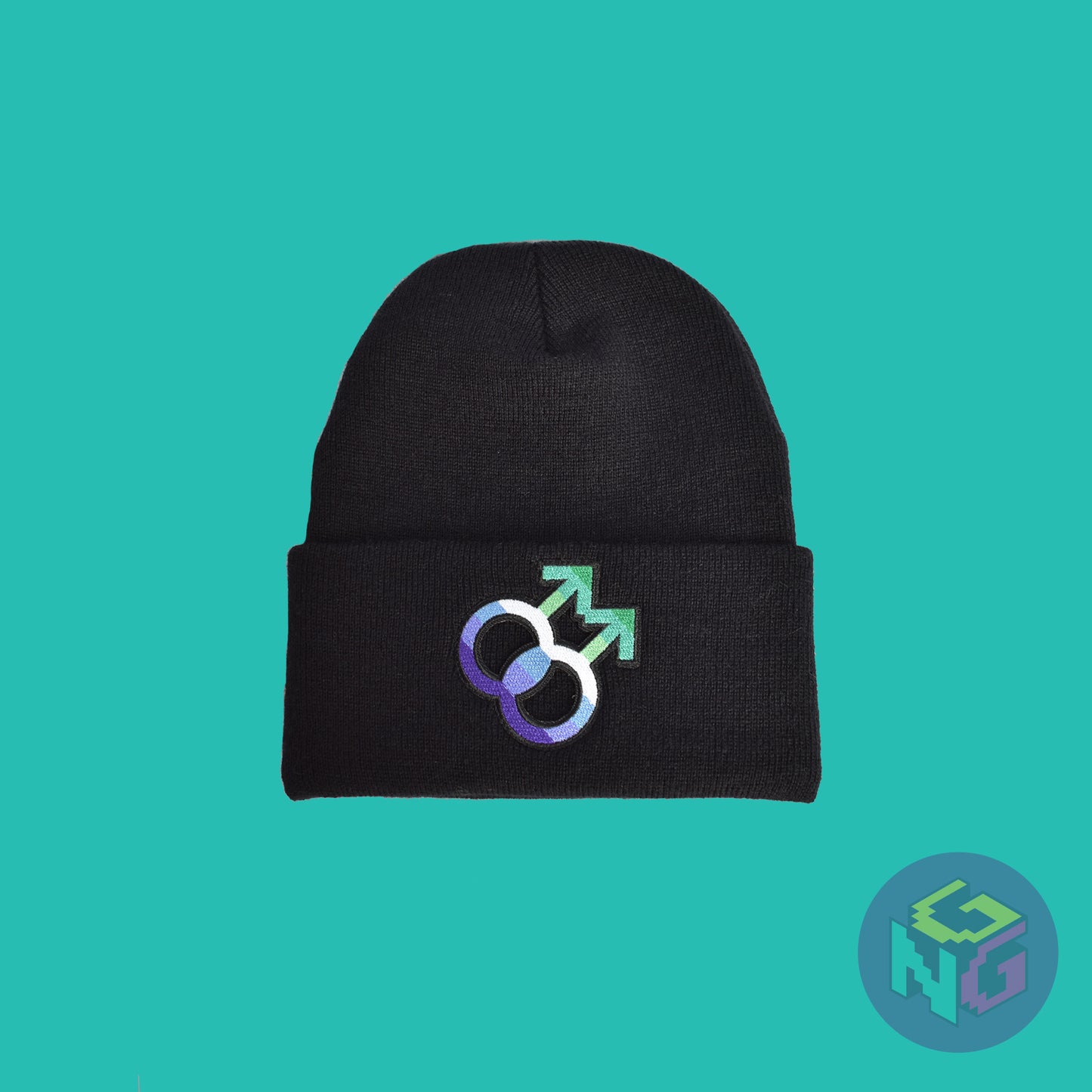 Black knit fabric beanie with the gay symbol in greens, blues, and white on the front. It is laying flat