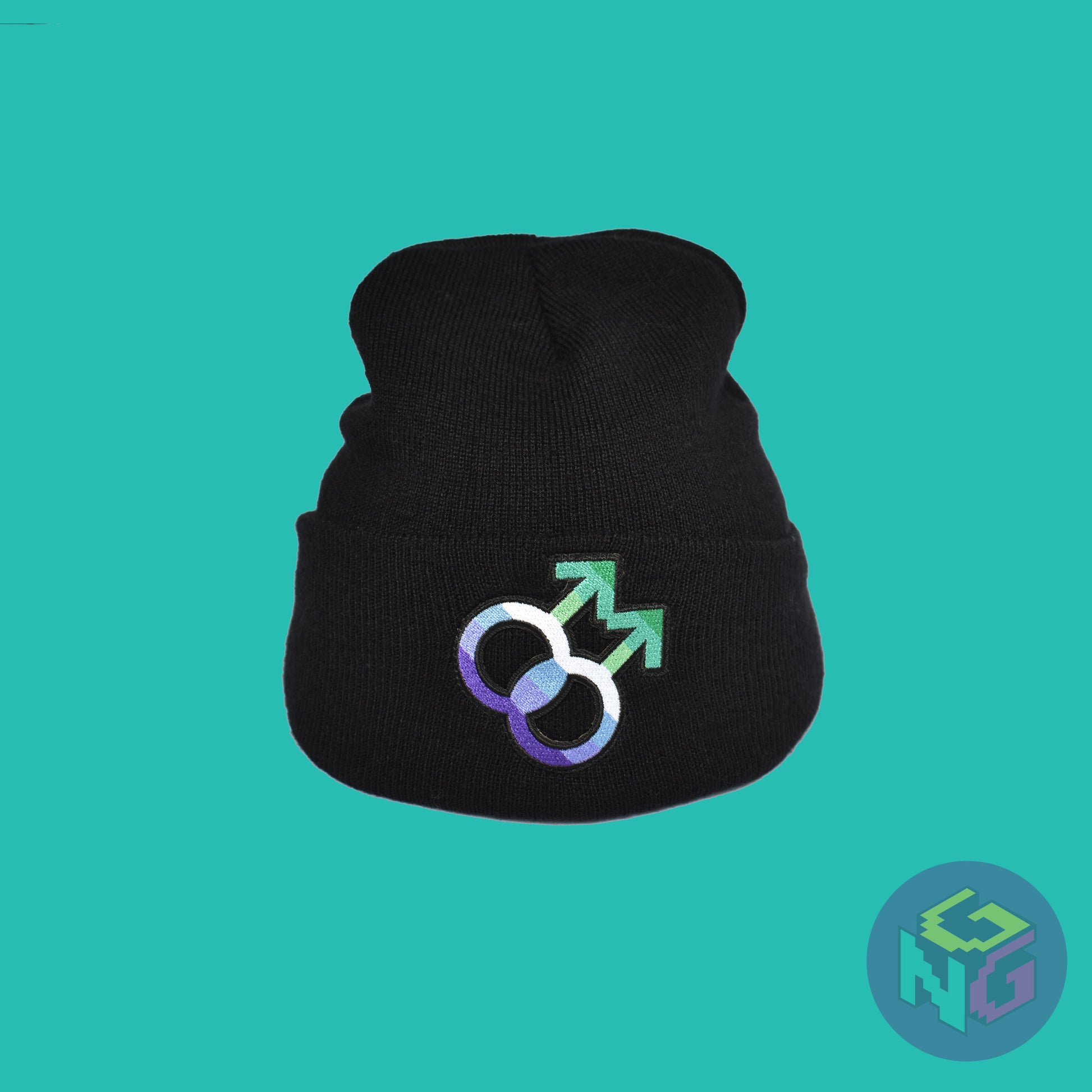 Black knit fabric beanie with the gay symbol in greens, blues, and white on the front. It is stretched and sitting upright in a front view