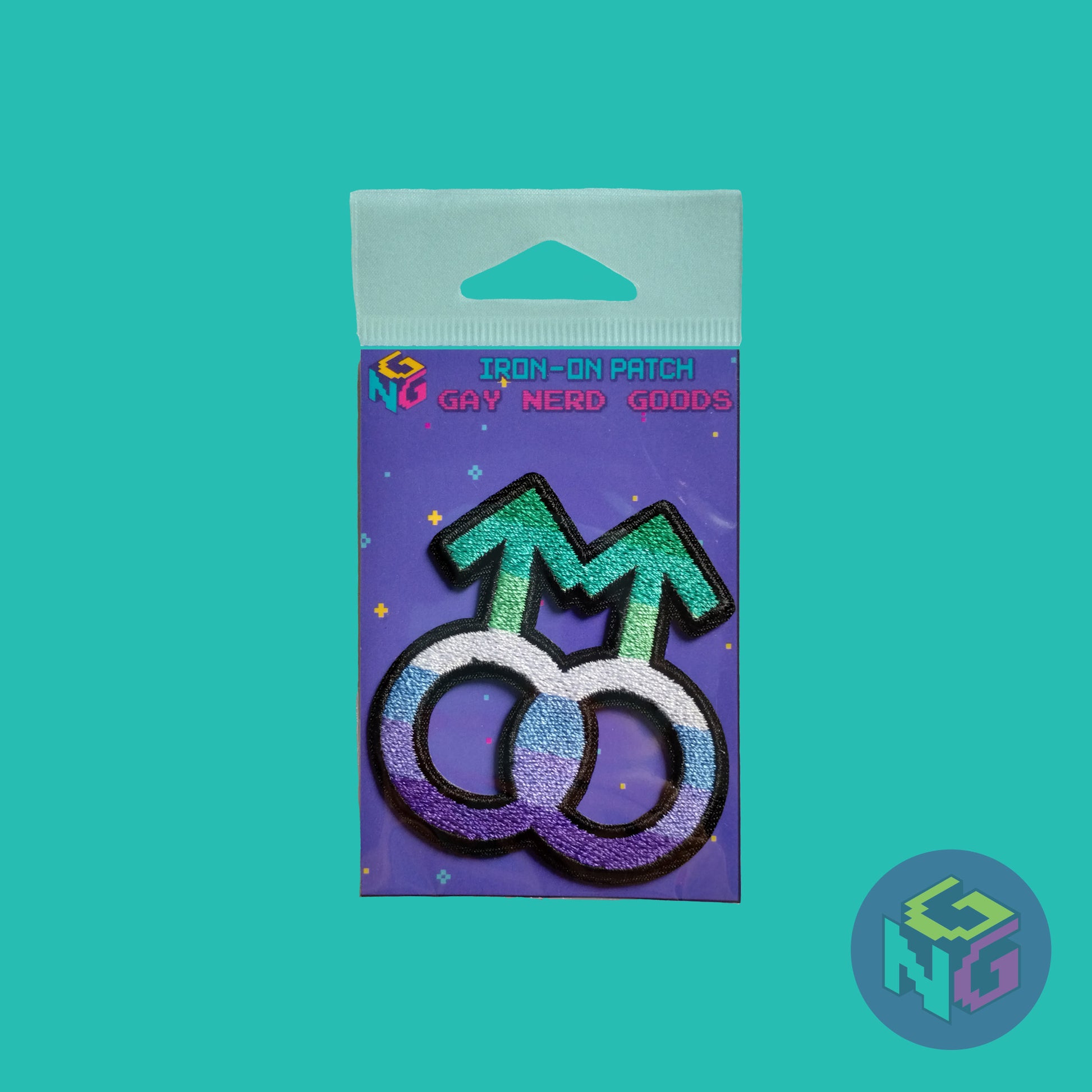 gay mlm patch in its purple packaging on a mint green background