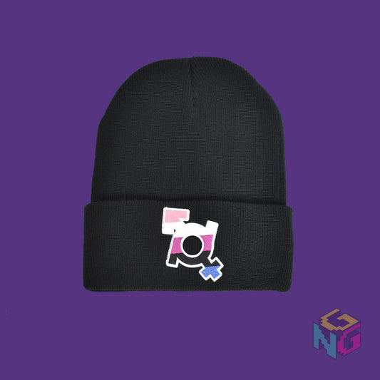 black beanie with genderfluid symbol patch on the front lying flat on purple background