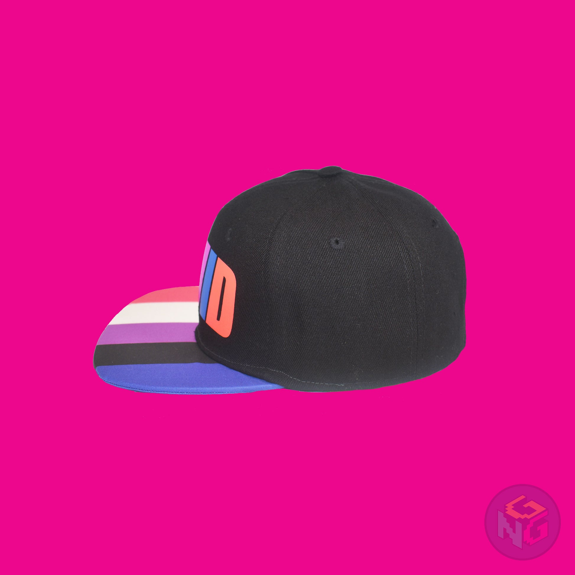 Black flat bill snapback hat. The brim has the genderfluid pride flag on both sides and the front of the hat has the word “FLUID” in peach, white, magenta, and royal blue letters. Left view