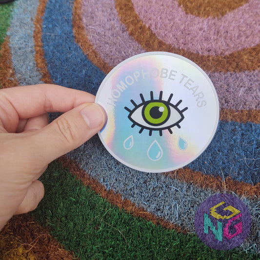 rainbow holographic homophobe tears sticker on rainbow welcome mat
