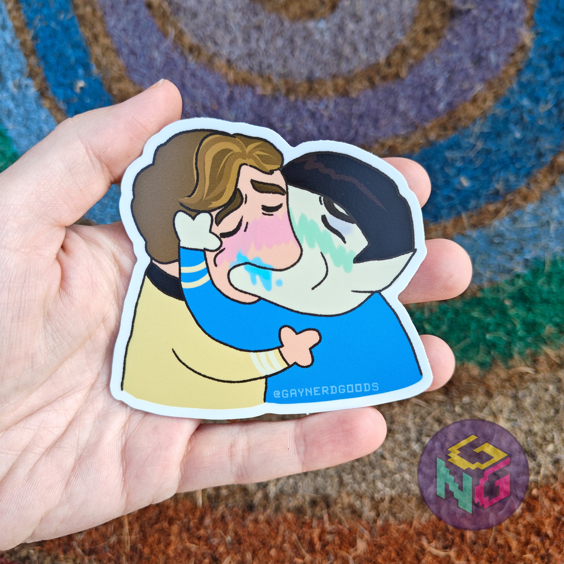 spock and kirk spirk making out waterproof sticker kiss meme being held in front of a rainbow