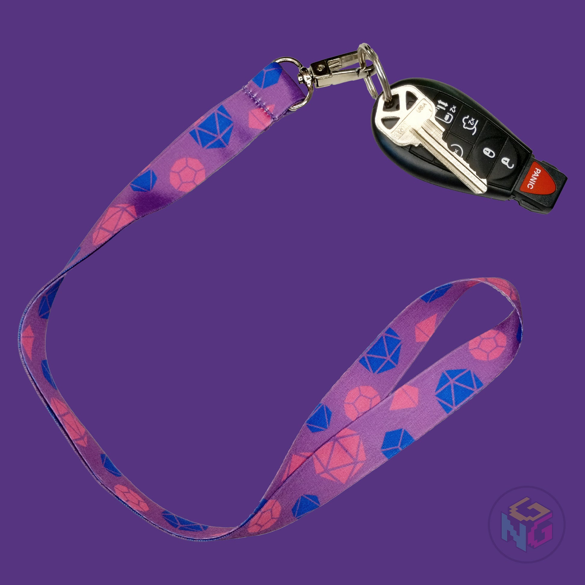 purple dnd bisexual lanyard showing the pink and blue tabletop dice with a key fob clipped to the end of the lanyard