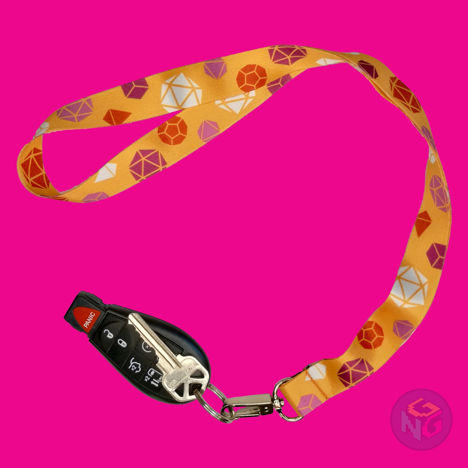 orange dnd lesbian lanyard showing the pink, orange, and white tabletop dice with a key fob clipped to the end of the lanyard