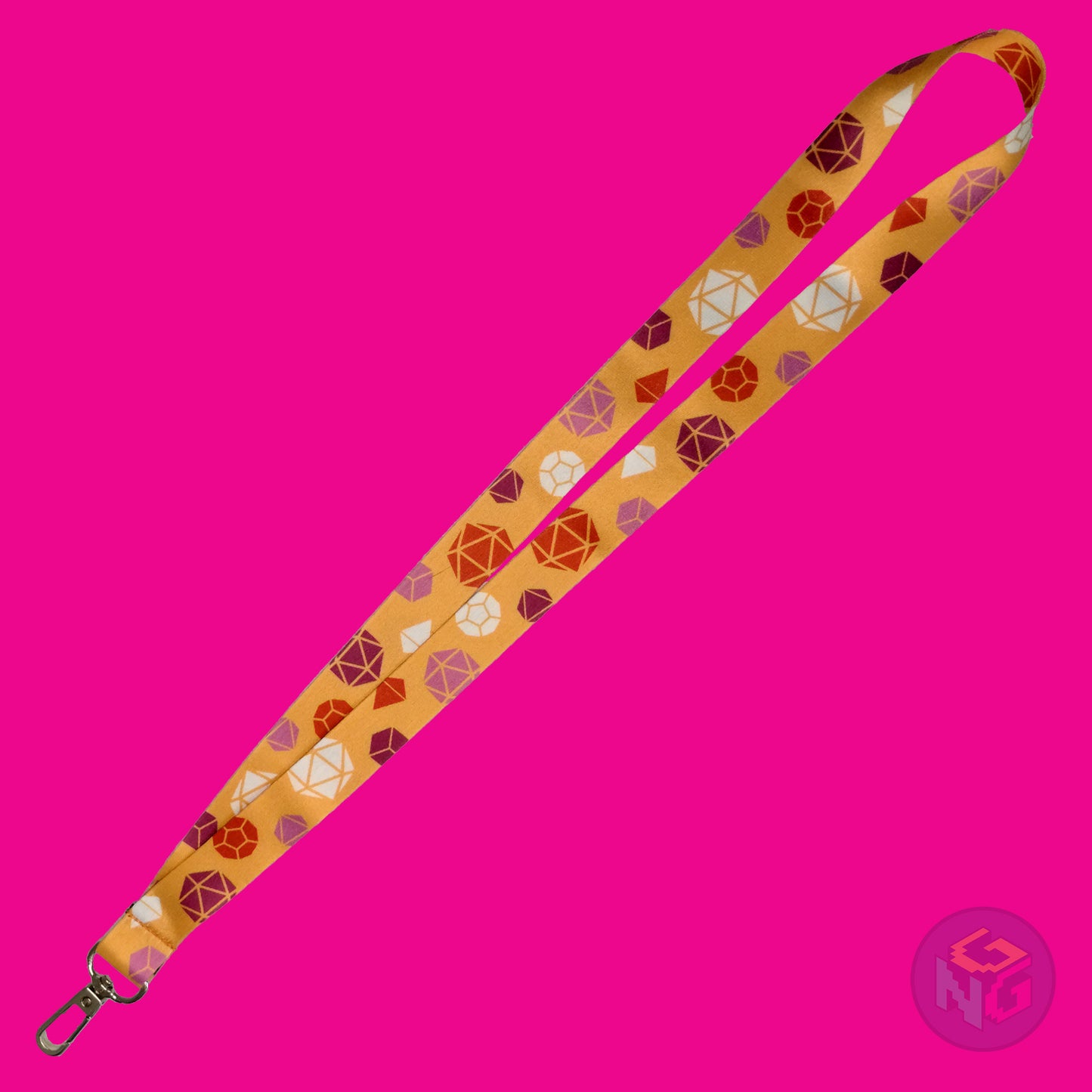 the lesbian dice lanyard lying flat showing the complete design and repeating pattern of polyhedral dice in lesbian colors