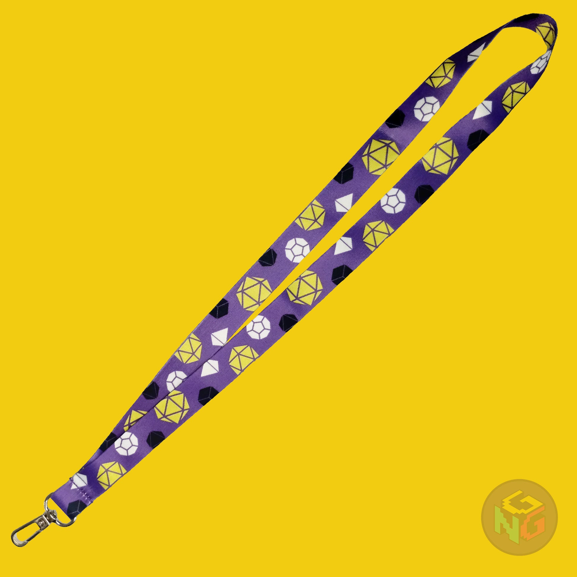 the nonbinary dice lanyard lying flat showing the complete design and repeating pattern of polyhedral dice in nonbinary colors