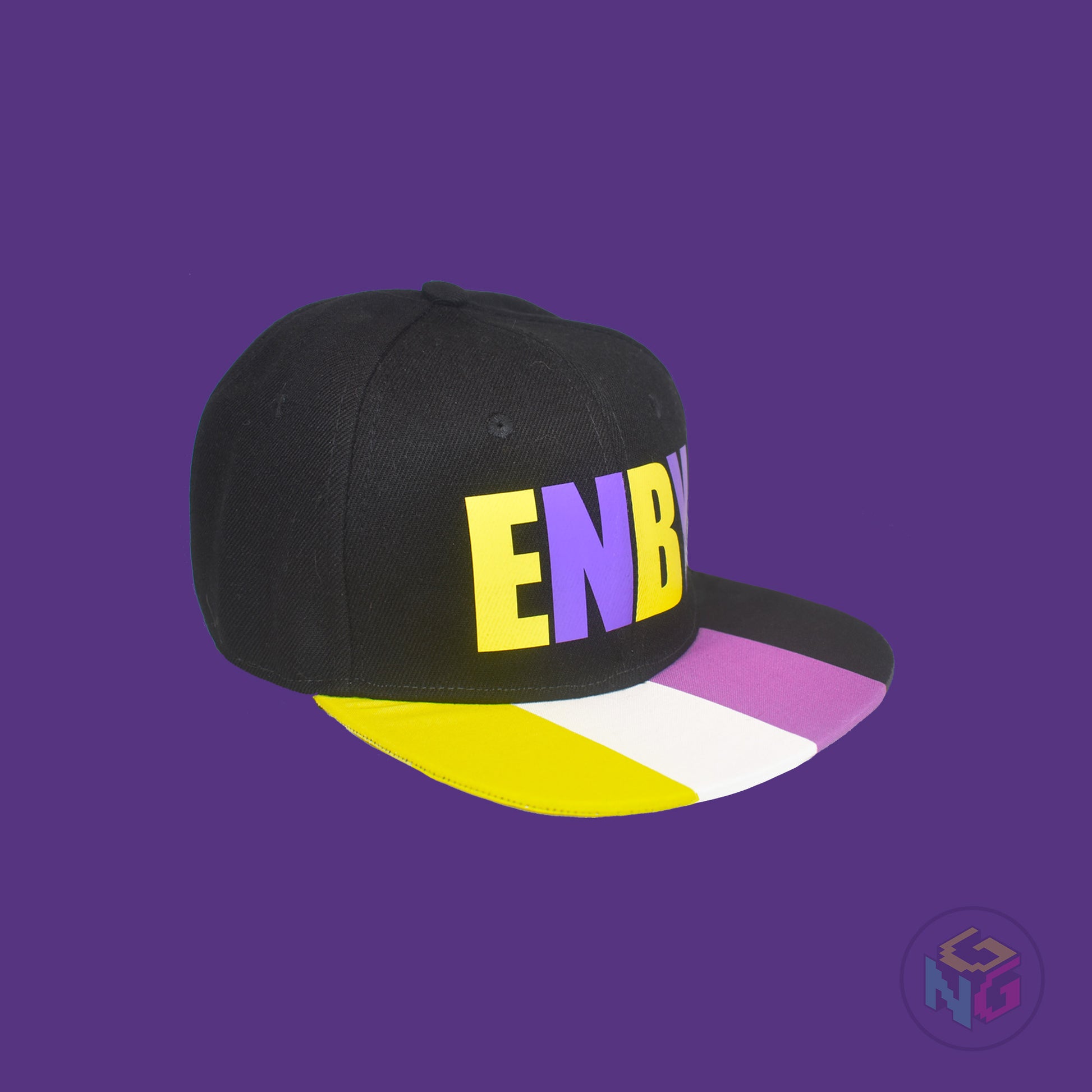 Black flat bill snapback hat. The brim has the nonbinary pride flag on both sides and the front of the hat has the word “ENBY” in yellow and purple letters. Front right view