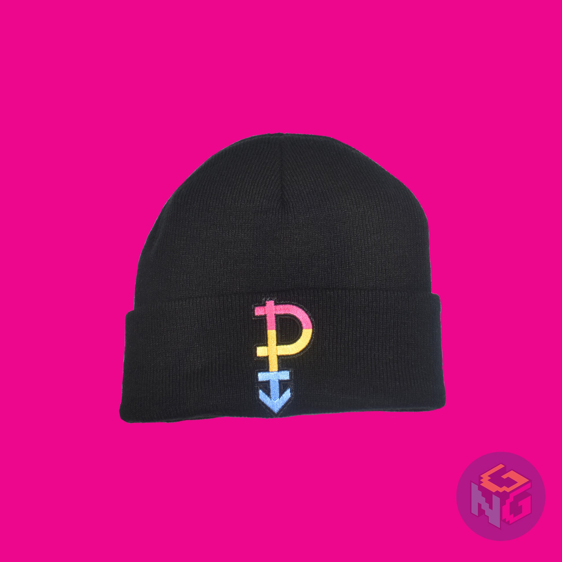 Black knit fabric beanie with the pansexual symbol in pink, yellow, and blue on the front. It is laying flat on a pink background