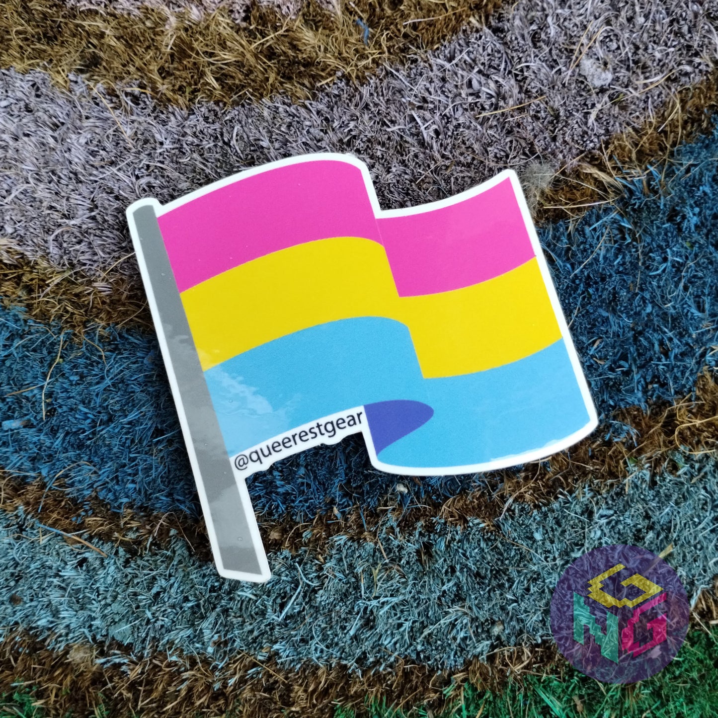 pansexual flag sticker lying flat on rainbow welcome mat