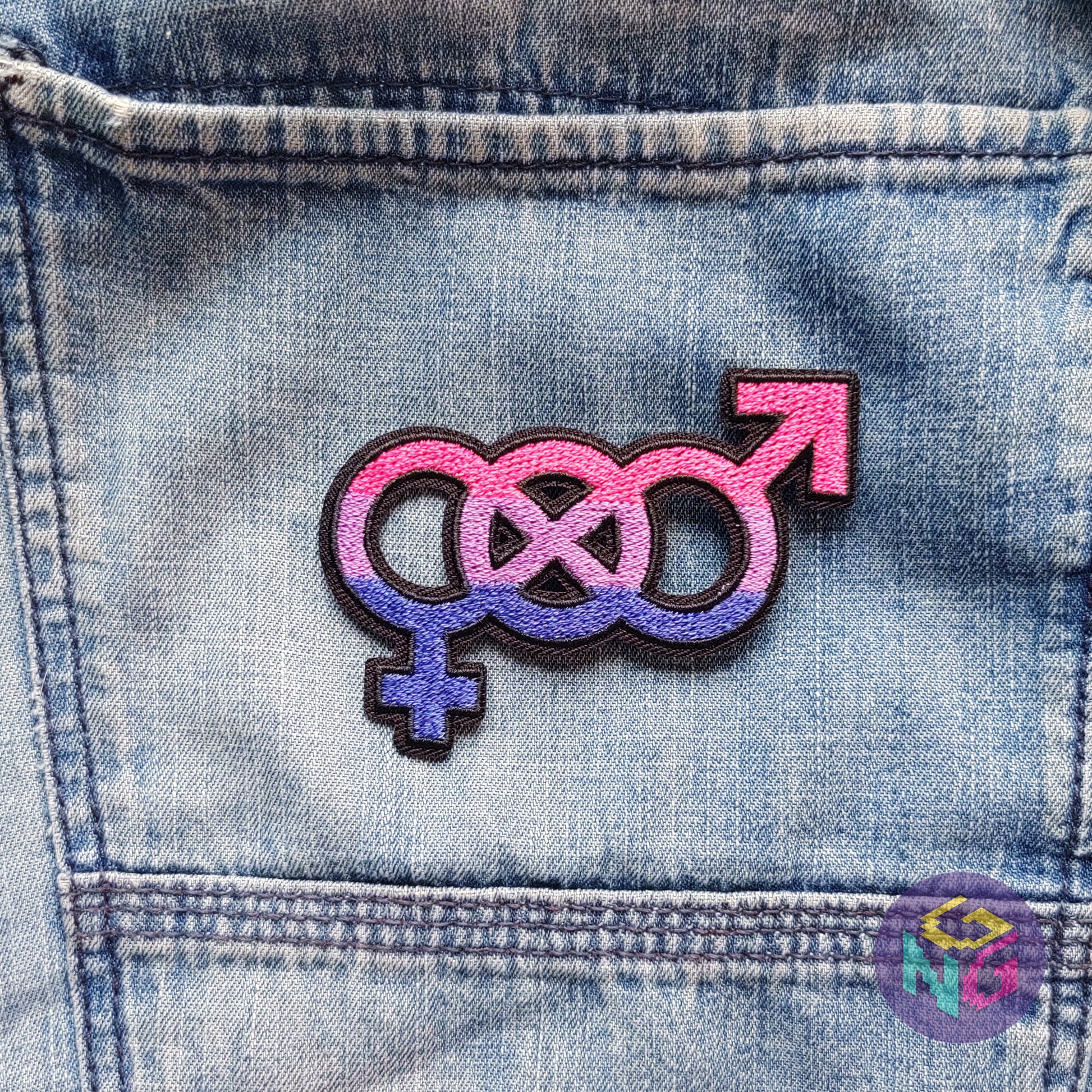 embroidered iron on bisexual patch on denim background