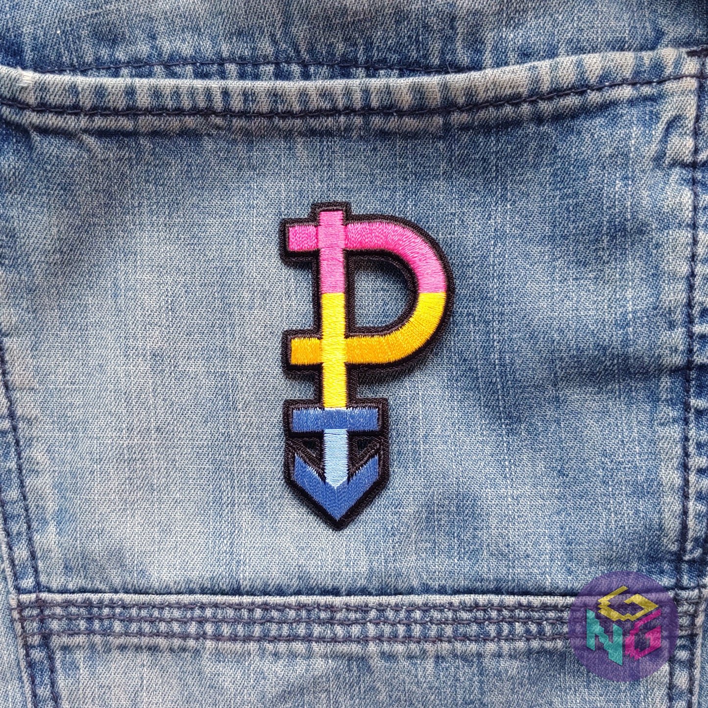 pansexual iron on patch on blue denim background