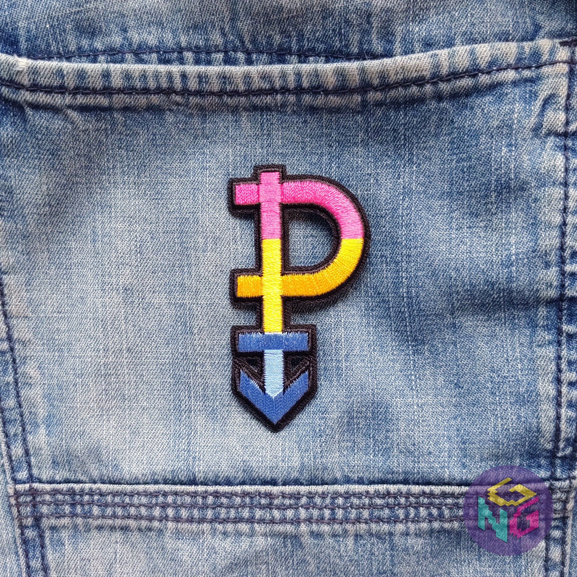 pansexual iron on patch on blue denim background