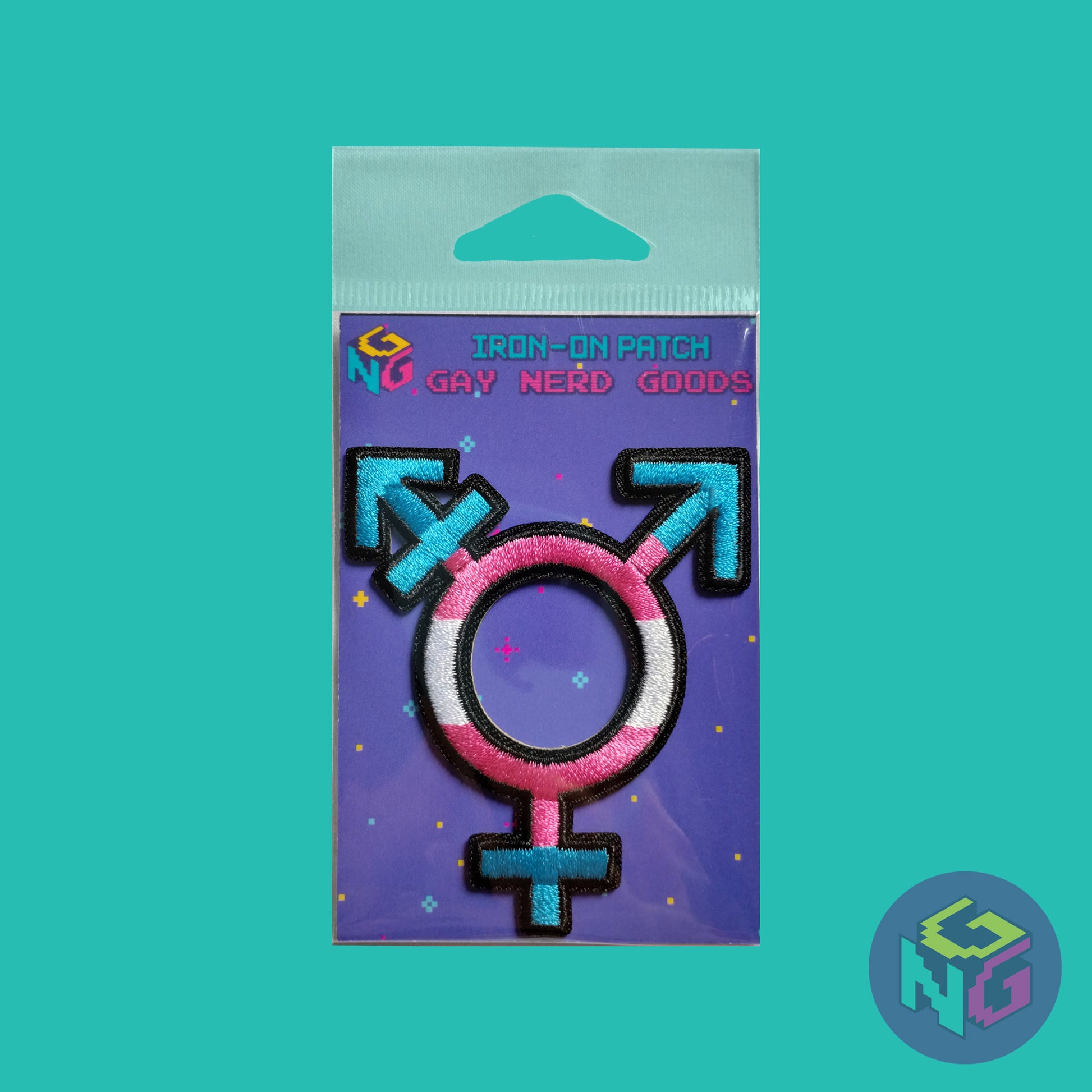 transgender embroidered patch in its packaging against a mint green background