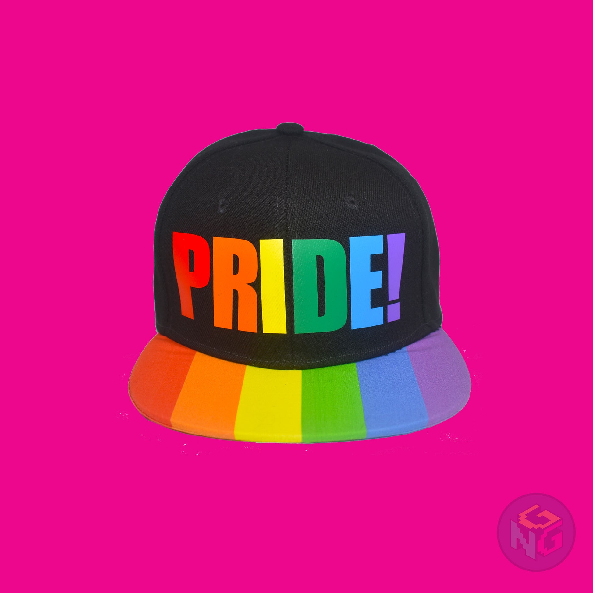Black flat bill snapback hat. The brim has the rainbow pride flag on both sides and the front of the hat has the word “PRIDE!” in rainbow letters. Front view