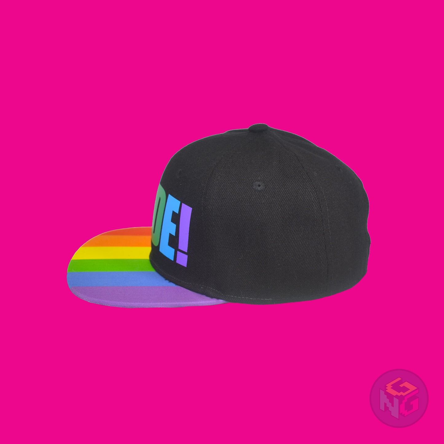Black flat bill snapback hat. The brim has the rainbow pride flag on both sides and the front of the hat has the word “PRIDE!” in rainbow letters. Left view