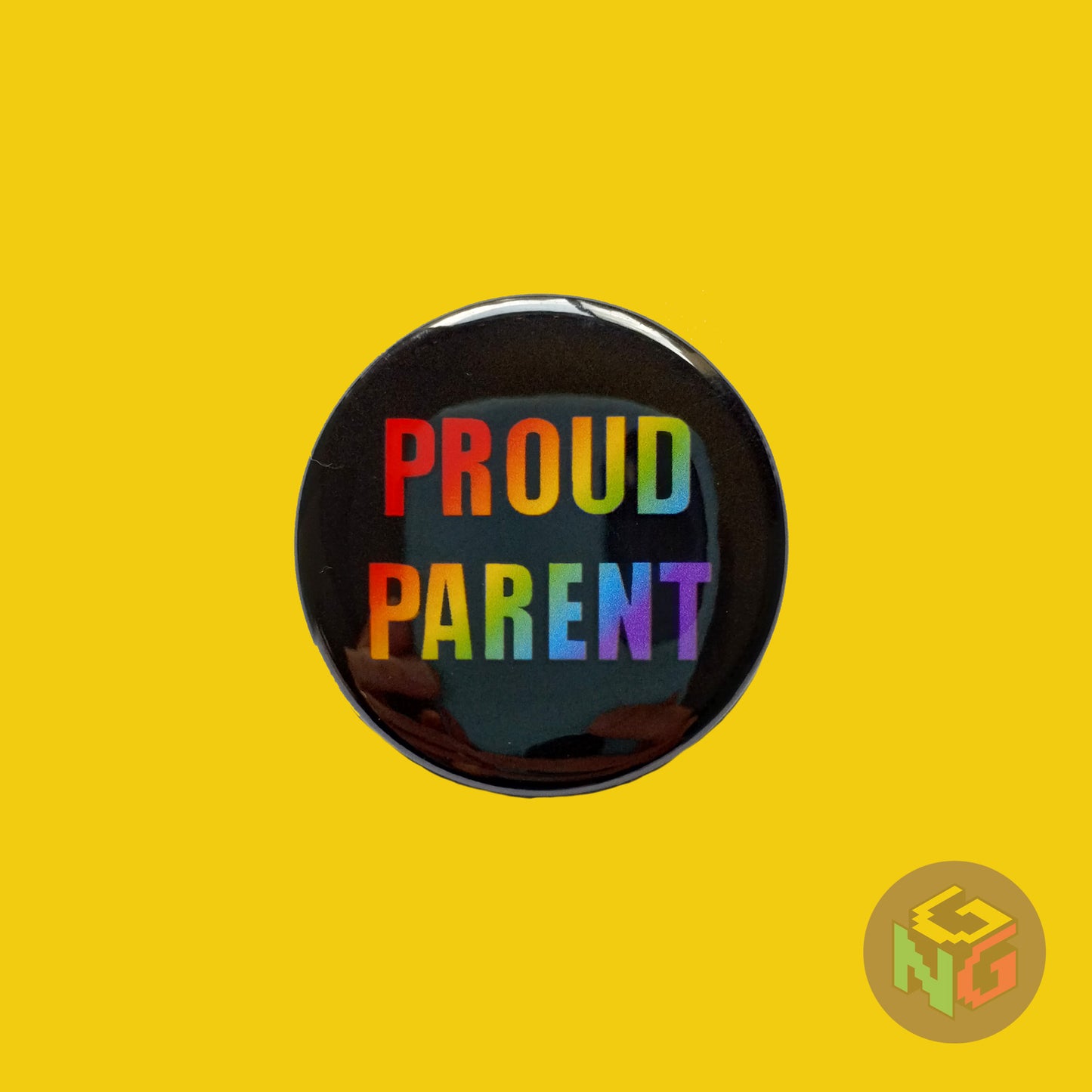rainbow proud parent button on yellow background