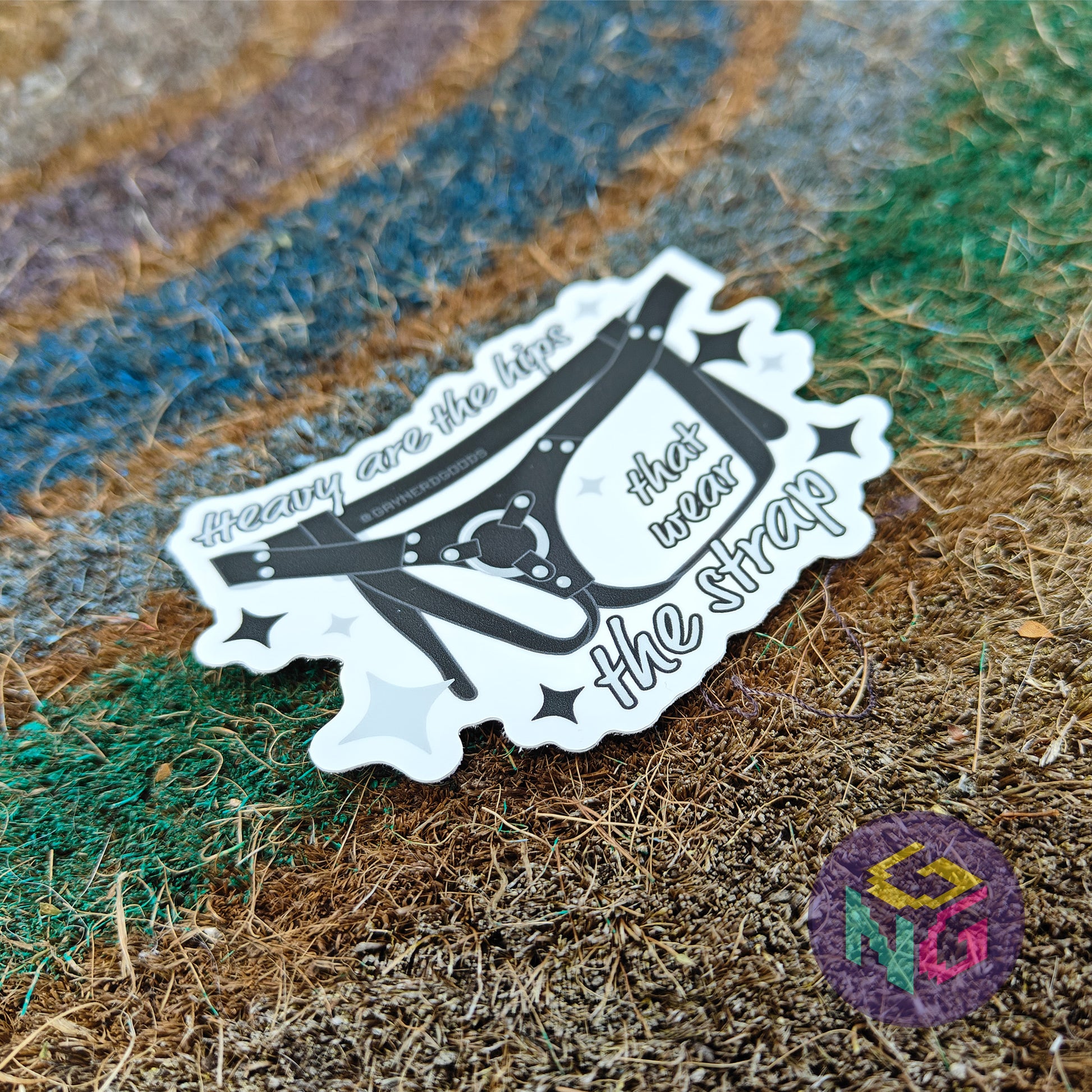 leather harness waterproof sticker with text "heavy are the hips that wear the strap"