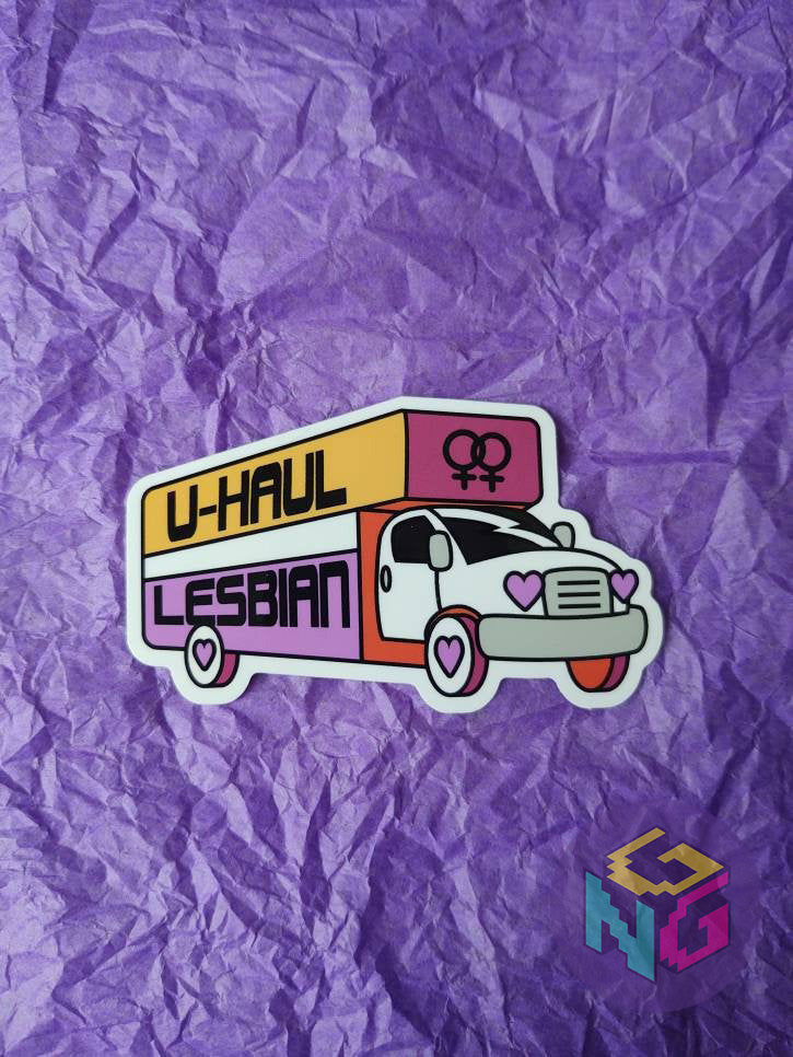 u-haul lesbian sticker lying flat on purple background