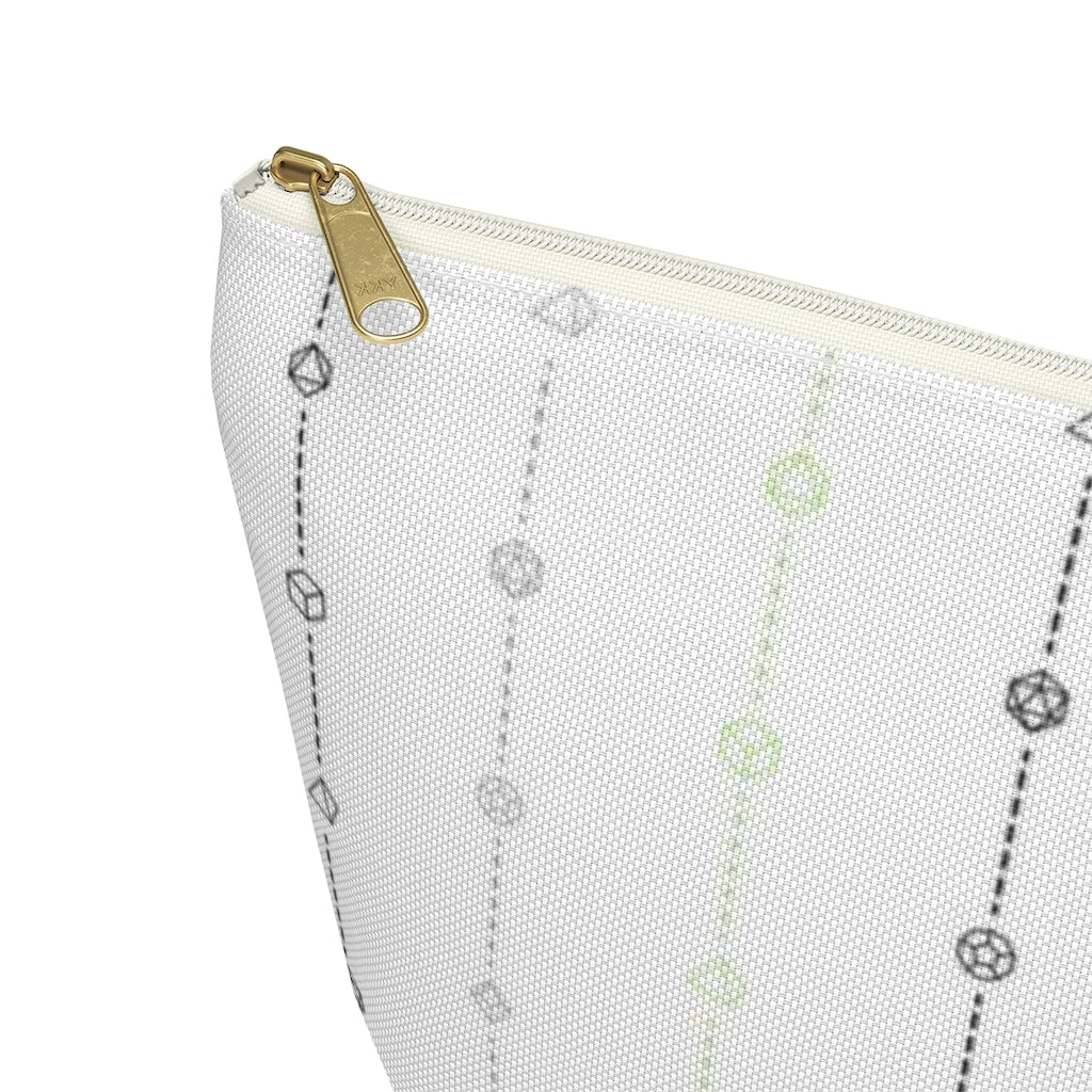 the large agender dice t-bottom pouch zoomed in on the corner on a white background. it's white with black, grey, and green stripes of dashed lines and polyhedral dice and a gold zipper pull