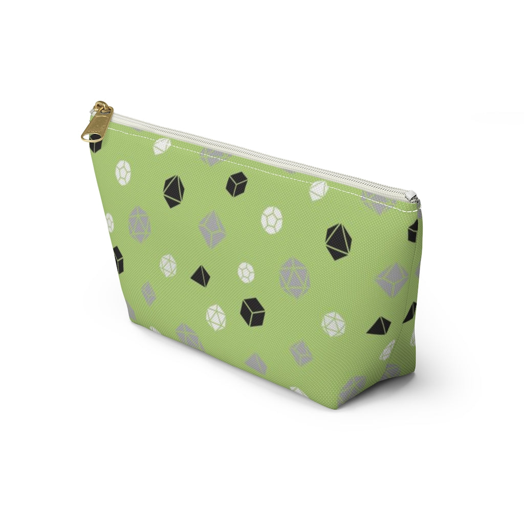the small agender dice t-bottom pouch in side view on a white background. it's green with grey, black, and white polyhedral dice and a gold zipper pull