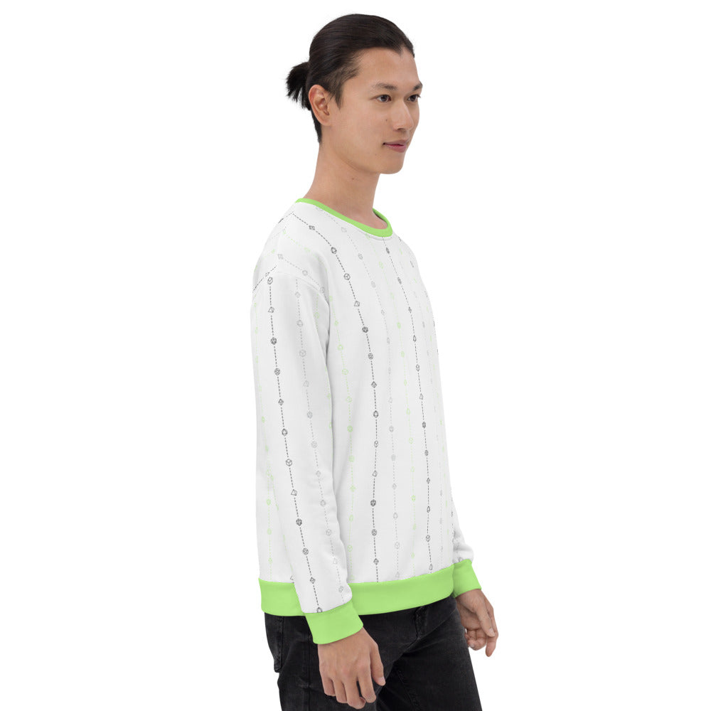 light-skinned dark haired model on a white background facing right wearing the agender pride dice sweater