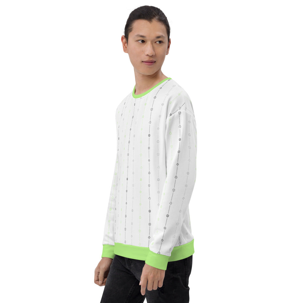 light-skinned dark haired model on a white background facing left wearing the agender pride dice sweater