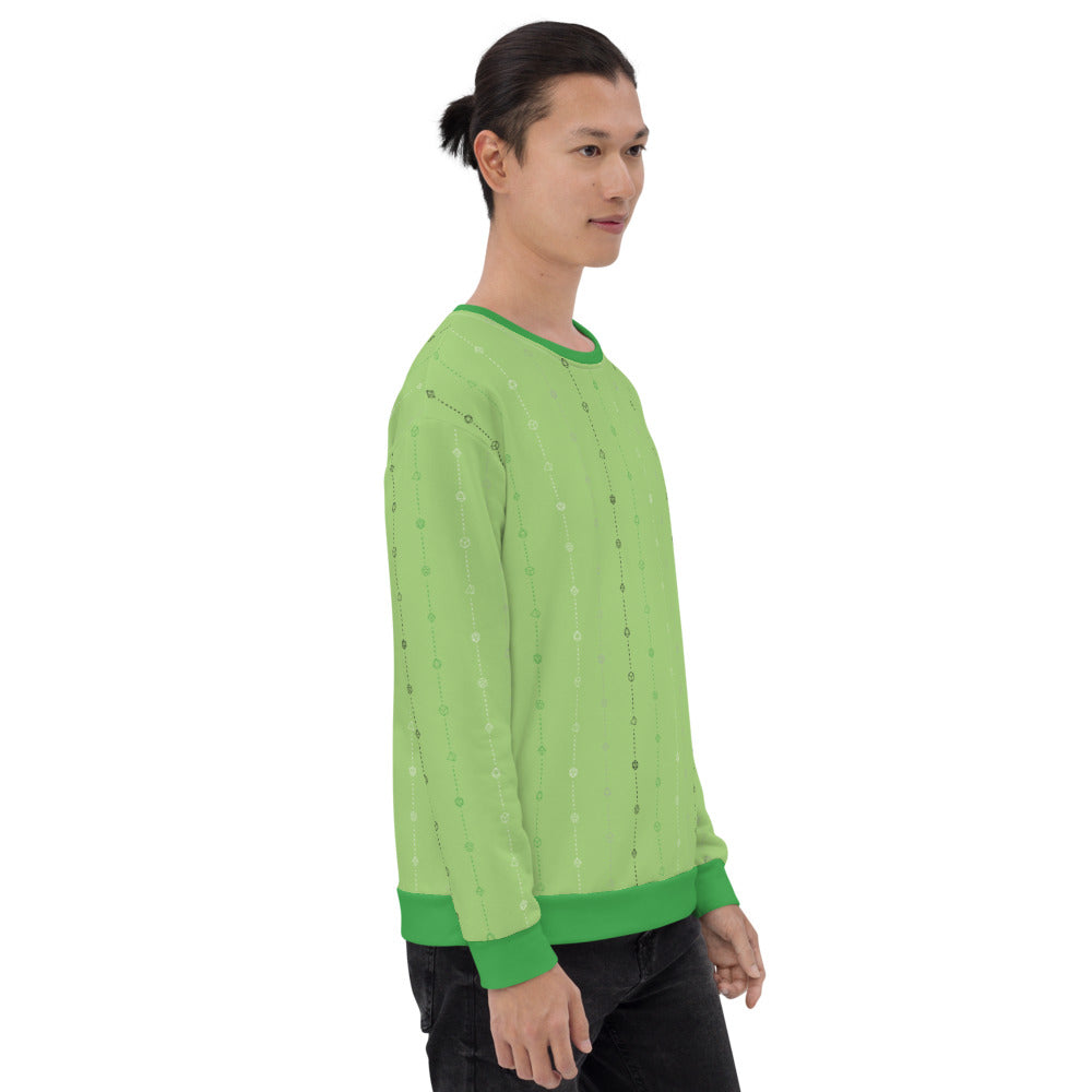 light-skinned dark haired model on a white background facing right wearing the aromantic pride dice sweater