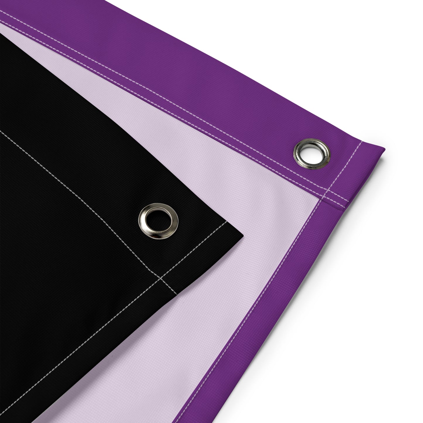 a close-up of the corner grommets on the asexual blackbeard pride flag