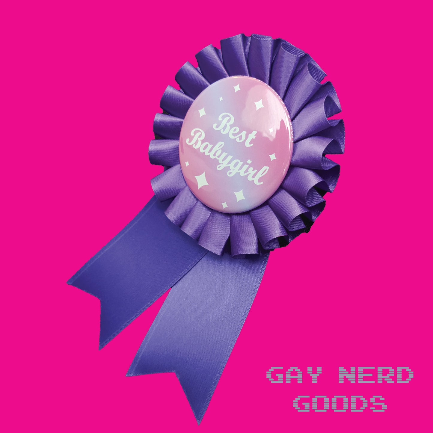 side angle view of the purple best babygirl award ribbon on a pink background
