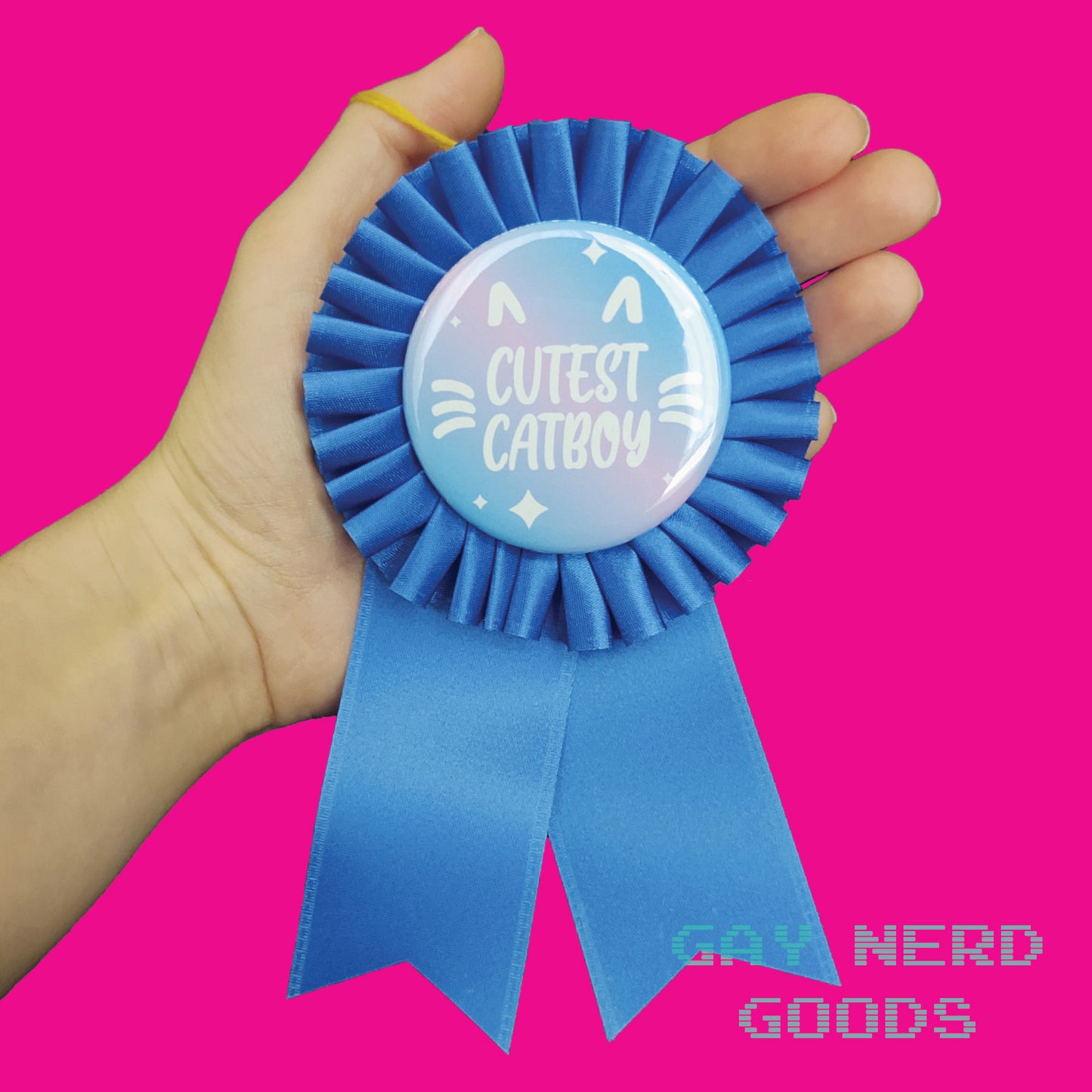 hand holding the cutest catboy prize ribbon against a pink background