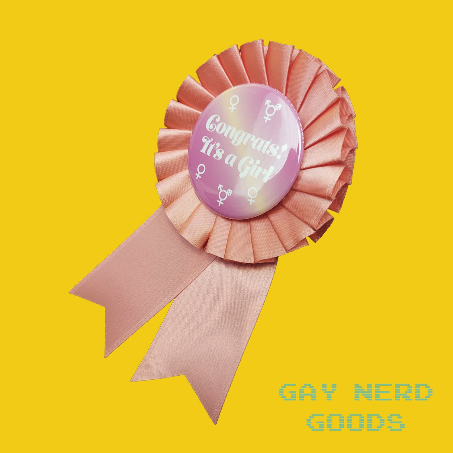 side view of the "congrats it's a girl" gender reveal rosette on a yellow background