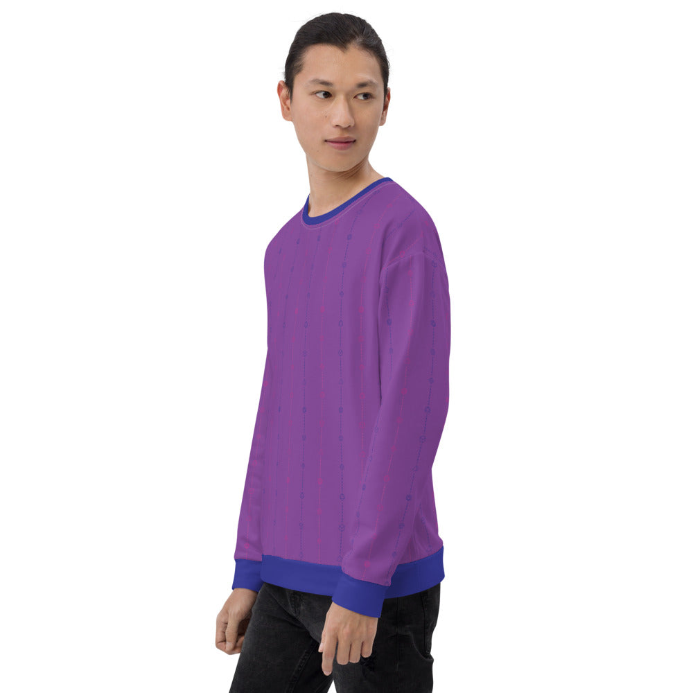 light-skinned dark haired model on a white background facing left wearing the bisexual pride dice sweater