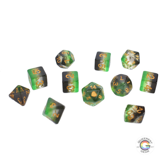 11 piece set of polyhedral dice scattered on a white background. They are transparent and colored in the stripes of the aromantic flag with gold ink.