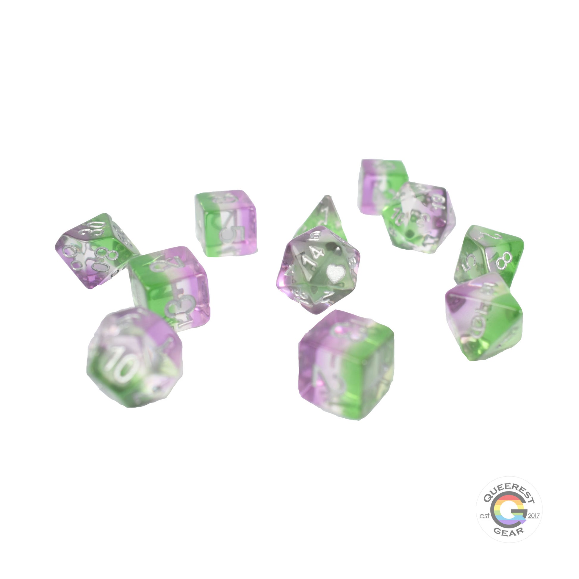 11 piece set of polyhedral dice scattered on a white background. They are transparent and colored in the stripes of the genderqueer flag with silver ink