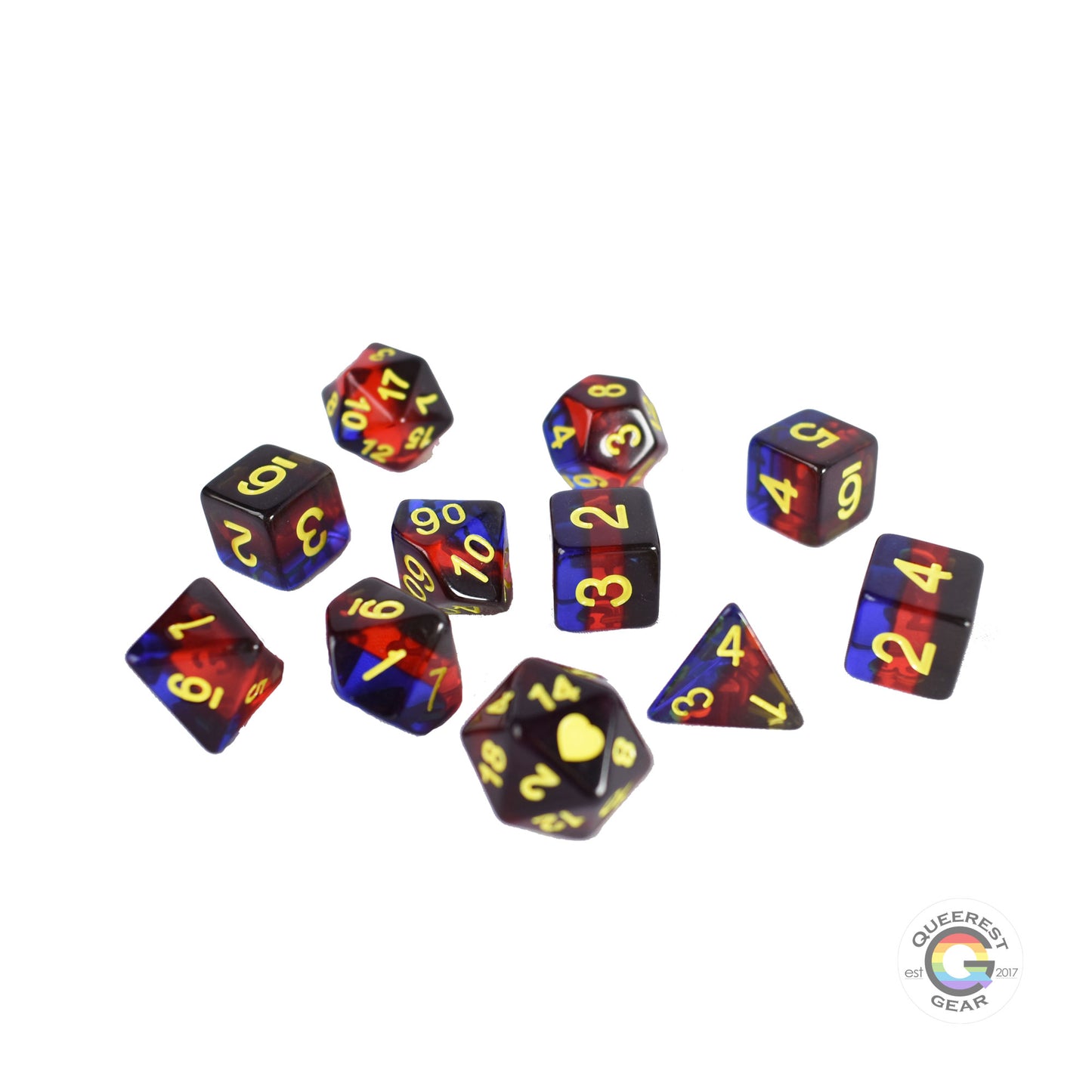 11 piece set of polyhedral dice scattered on a white background. They are transparent and colored in the stripes of the polyamory flag with yellow ink