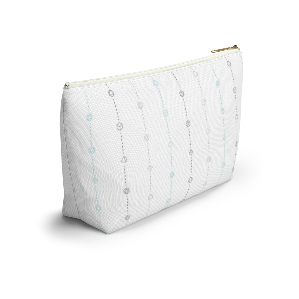 the large demiboy dice t-bottom pouch in side view on a white background. it's white with light grey, dark grey, and blue stripes of dashed lines and polyhedral dice and a gold zipper pull
